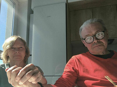 My parents in the kitchen in their apartment.  May 2025. Yekaterinburg. Russia.