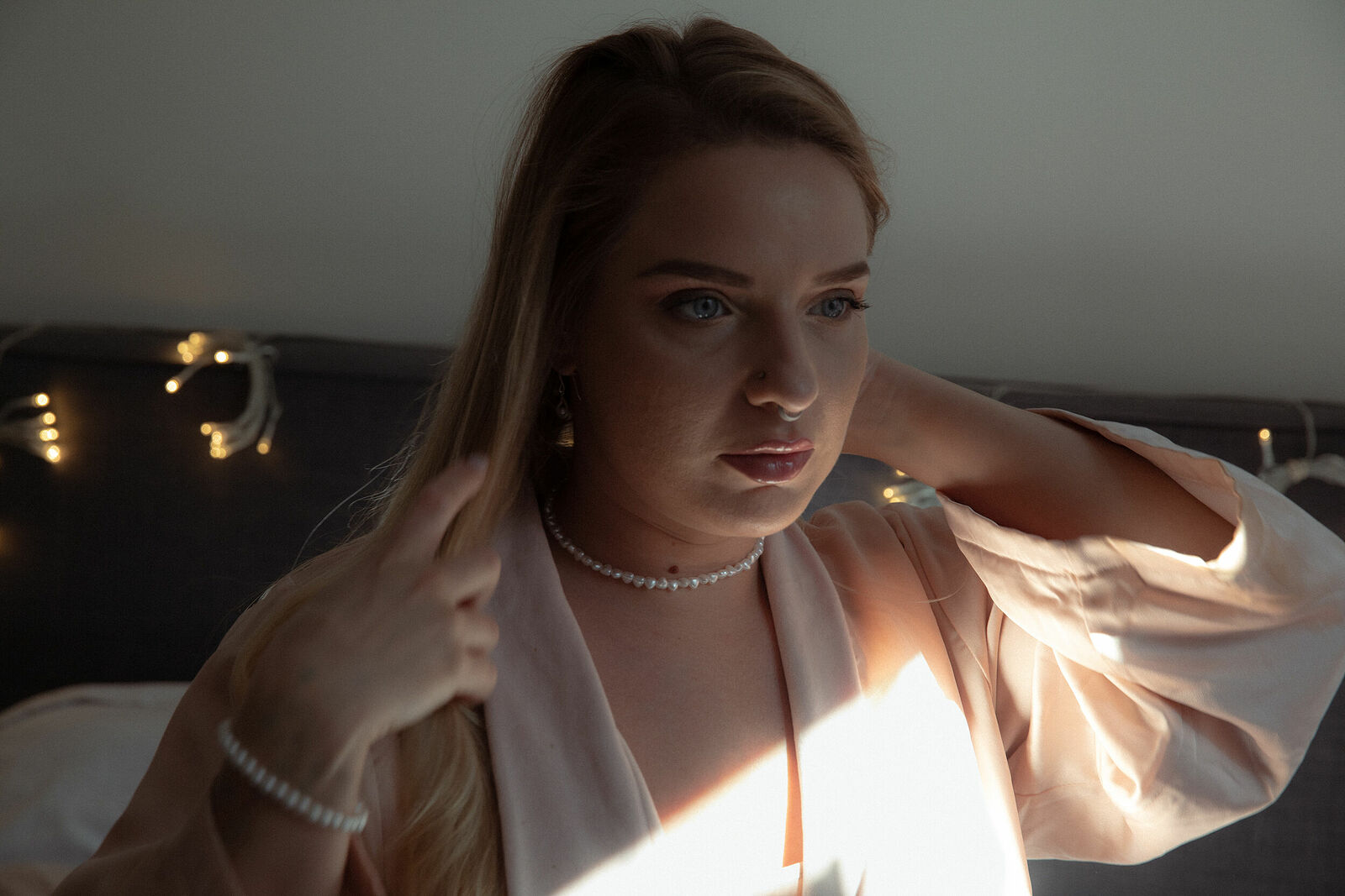 Valda in her room in apartment in Paris, France. March 2025.