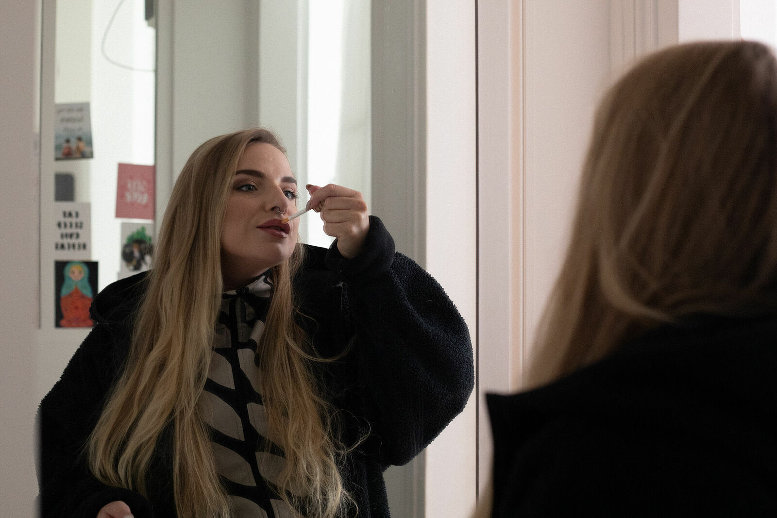 Vlada getting ready before going for the regular anonymous meeting. March’2025, Paris.